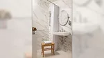 white marble-look tile bathroom