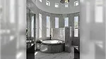 Elegant tiled bathroom featuring Luce Clipper Elevation Pearl