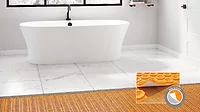 Schluter Peel-and-Stick uncoupling membrane on bathroom floor with a tub.