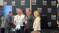 Fifth Gear Technologies Wins Disruptor Award Best of TISE Award presentation giving Fifth Gear Technologies the StonExpo Disruptor Award