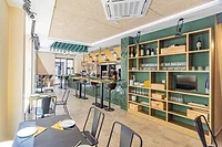 Inside Trenkaclosques with olive green ceramic tile from Decocer