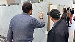 Architects looking at slabs at Grespania