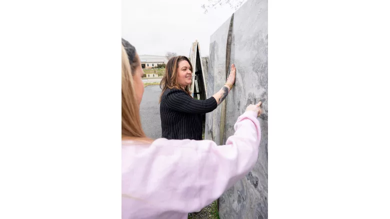 Sarah Nicholas looking at a slab