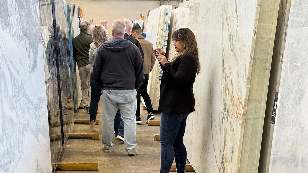 Fabricators looking at slabs in Triton Stone Group's facility in Birmingham, AL