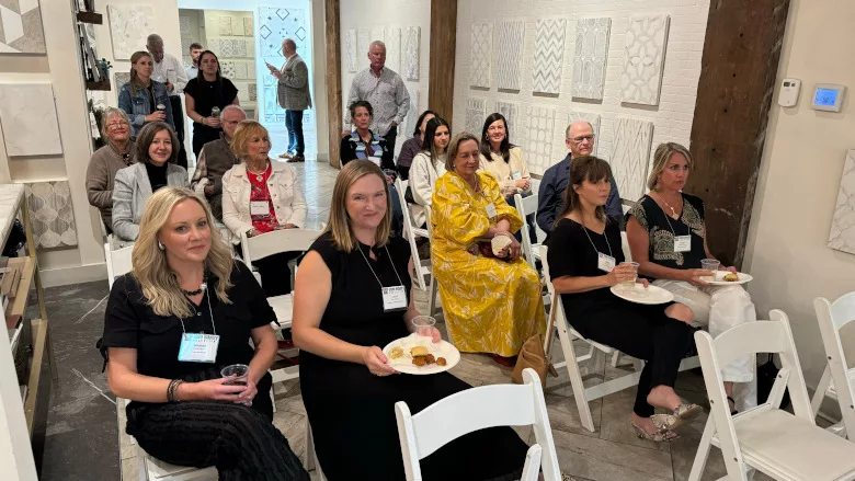 Designers sitting during Wine & Stone CEU session