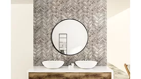 herringbone backsplash behind mirror