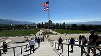 NSI Study Tour 2024 group walking down steps at Utah State Capitol