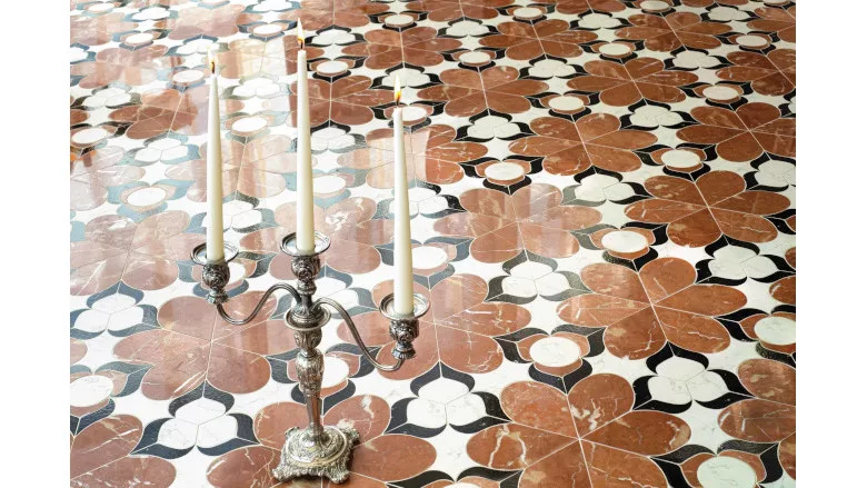 clay and black colored floral mosaic