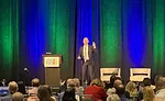 man presenting at total Solutions Plus 