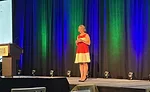 woman presenting at total Solutions Plus 