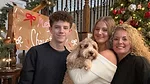 Amie Gilmore with Family and Their Dog
