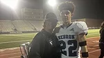 Amie Gilmore with son Blake at football game