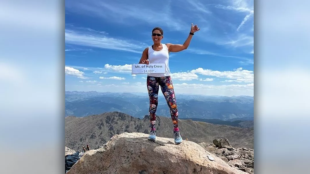 Marcette Gordon on top of Mt. Holy Cross in Colorado