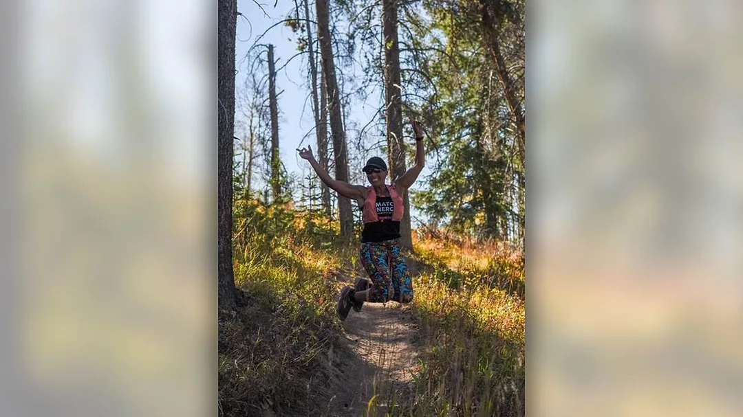 Marcette Gordon trail jumping on hiking trail