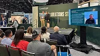 Joey Ontra accepting 2025 Coverings Rock Star Award at the international stone and tile exhibition