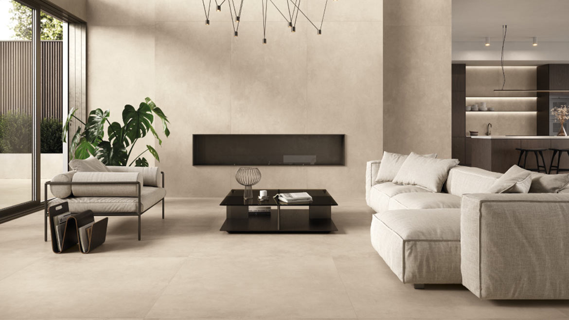 The image shows a room with Moov Up Cream porcelain stoneware tiles by Ceramiche Keope.