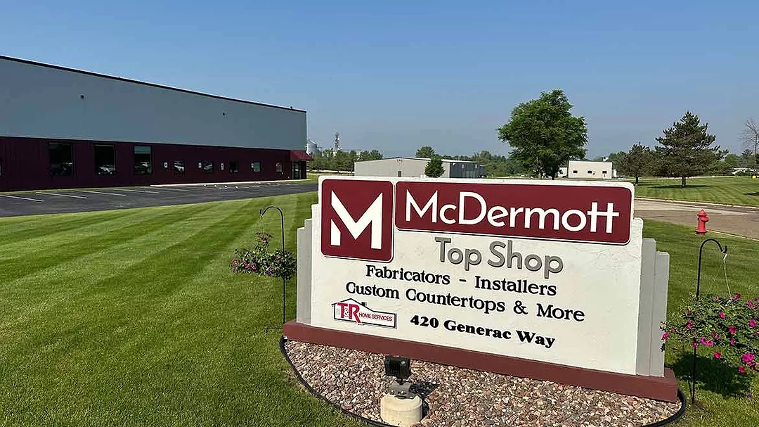 Sign outside McDermott Top Shop's Facility