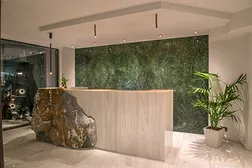 Pentelikon marble reception desk and flooring