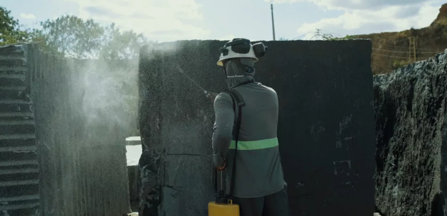 Worker Washing Off Stone Block