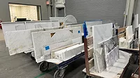 countertops on racks at a fabrication shop countertops on racks at a fabrication shop