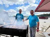 Buechel Stone Employees Two Buechel Stone "Rock Stars" at a grill