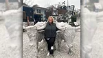 Glenda Henneboehle with stone bull statues