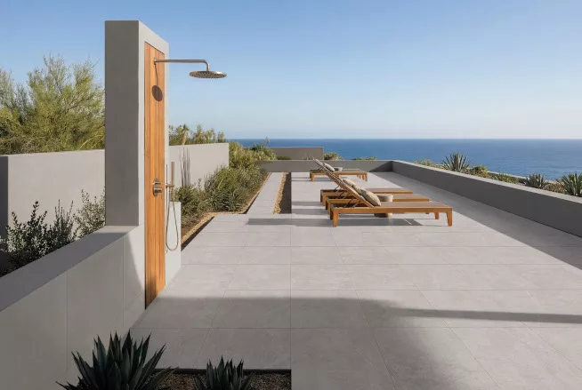Wonder Porcelain Cemento Couture Collection on patio setting
