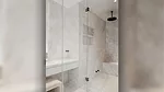 Calacatta "Wow" from Natural Stone Collection by Antolini on bathroom vanity