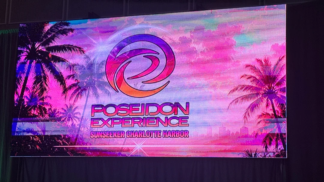 The Poseidon Experience Graphic on Big Screen in Ballroom