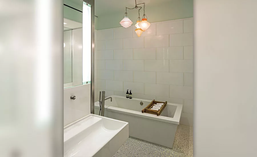 White Thassos marble on tub and shower walls