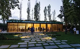 Inside the pavilion, a worktable and a wide range of samples