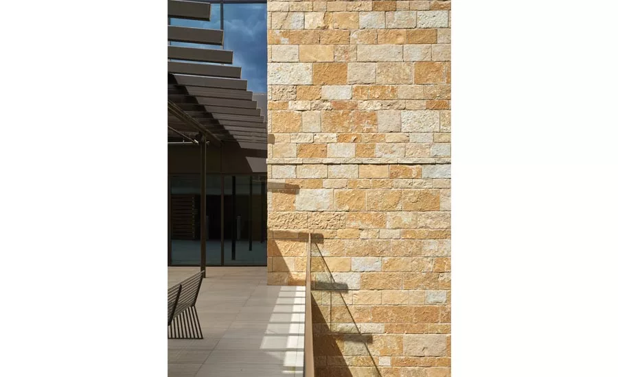 Thin cream-colored limestone bands mark the elevation datum