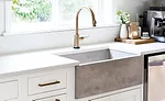 Silestone countertops and decorative tile backsplash