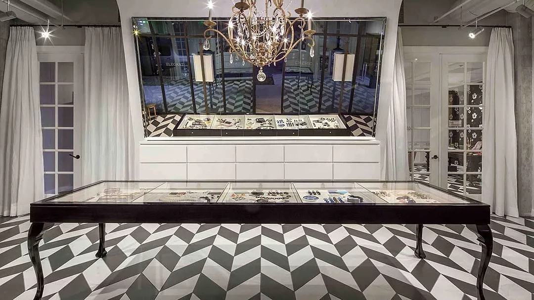 CSTD 1221 Web Exclusive: Maggie Louise Winter 2021 Slide 2. A canted mirror and wall and jewelry store-inspired shadow box.