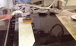Two radial arm face polishers for honing and repolishing pieces