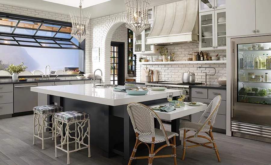 The neutral tones and open-concept design of the greenhouse kitchen