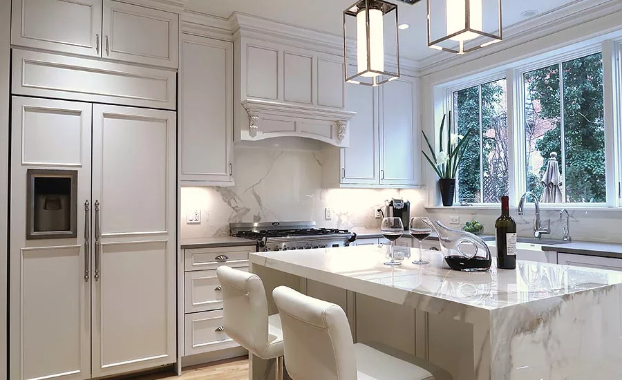 new decorative tin ceiling, complemented by a perimeter countertop fabricated from Caesarstone