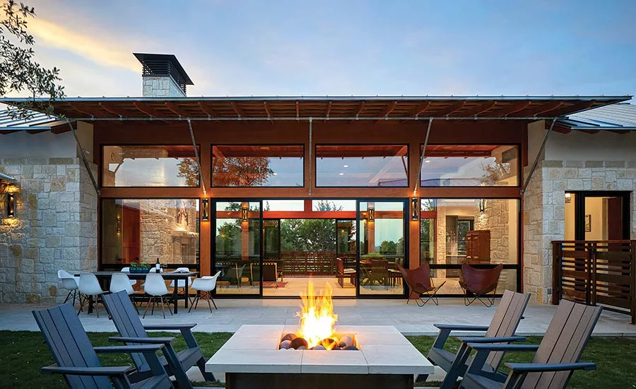all-glass room with indoor/outdoor courtyard