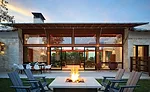 all-glass room with indoor/outdoor courtyard