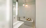 White Thassos marble in a 12- x 24-inch format