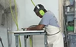 An area of the shop is designated for handwork.