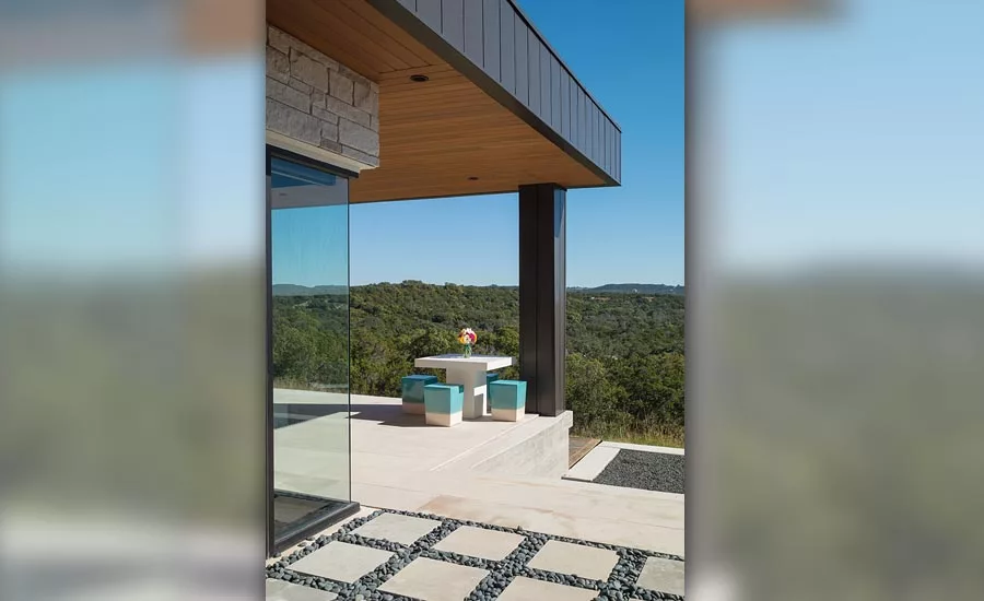 A covered patio is located right off the living room
