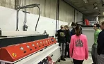 Students visit fabrication shop, learn about stone production