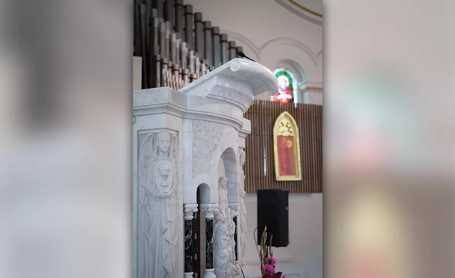 Marble book holder added to the existing historic pulpit