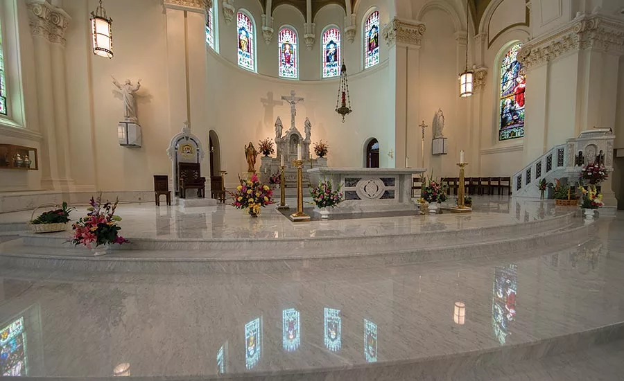 Carrara marble stairs leading to the altar