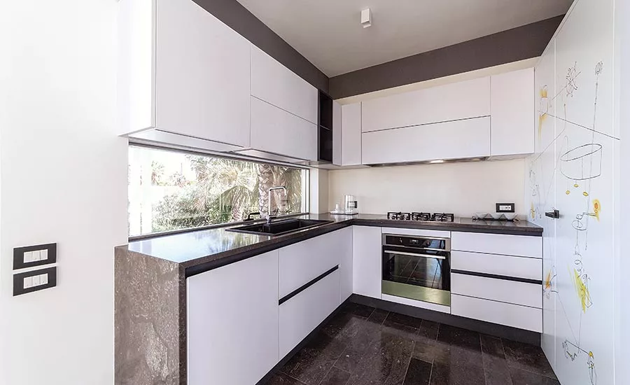 vein-matched wall cladding and countertops