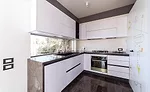 vein-matched wall cladding and countertops