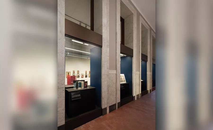 white-gray marble wainscoting and a black soapstone wall base