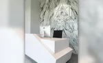 SSC Countertops specializes in bookmatching wall panels. 