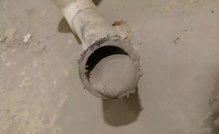 Pipe clogged with gray water when pumped directly from a pit